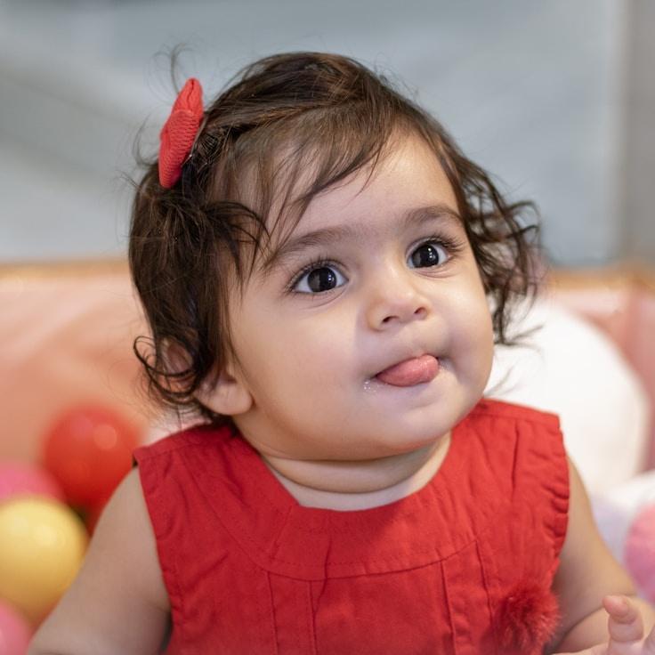 Avery Lin, Lead Design Curator at Brush Wood Supply, reviewing corporate floral arrangements
